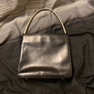 PRADA Leather bag with metal handle